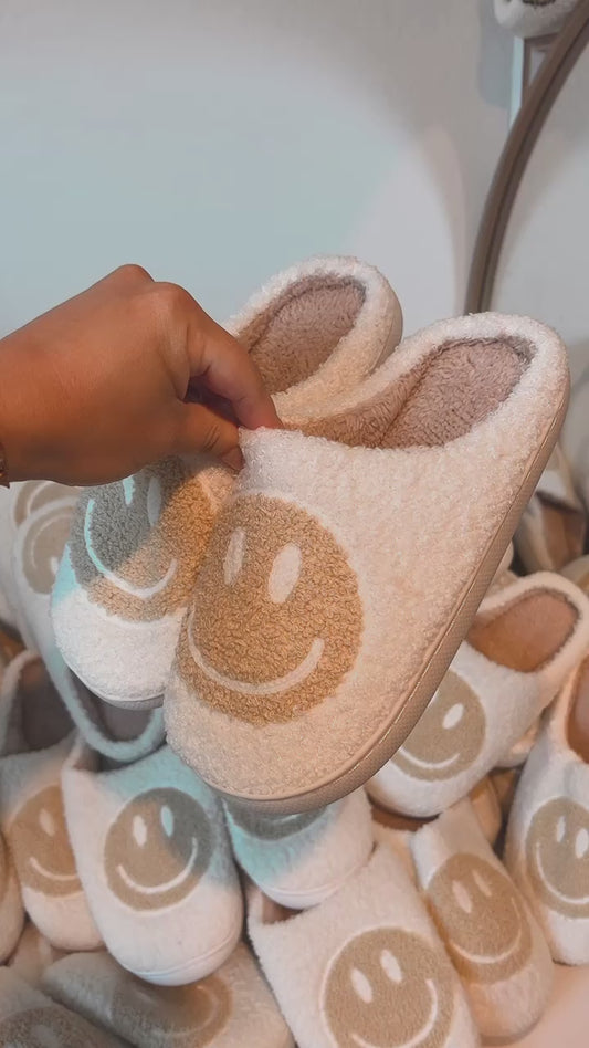 neutral smiley face slippers
