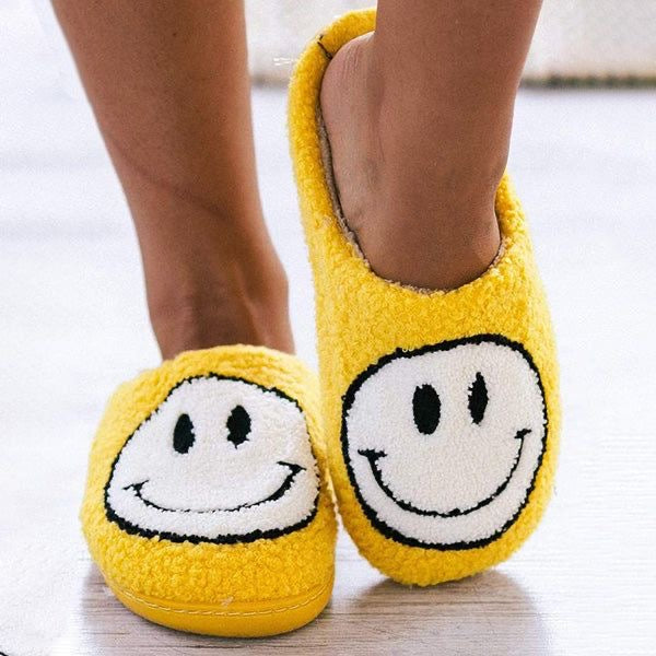 tan smiley face slippers