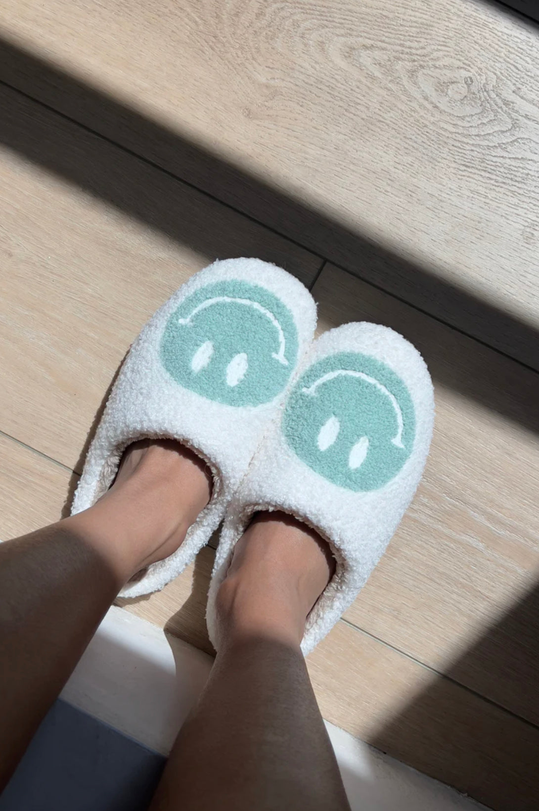 butter yellow smiley face slippers