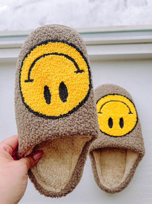 tan smiley face slippers